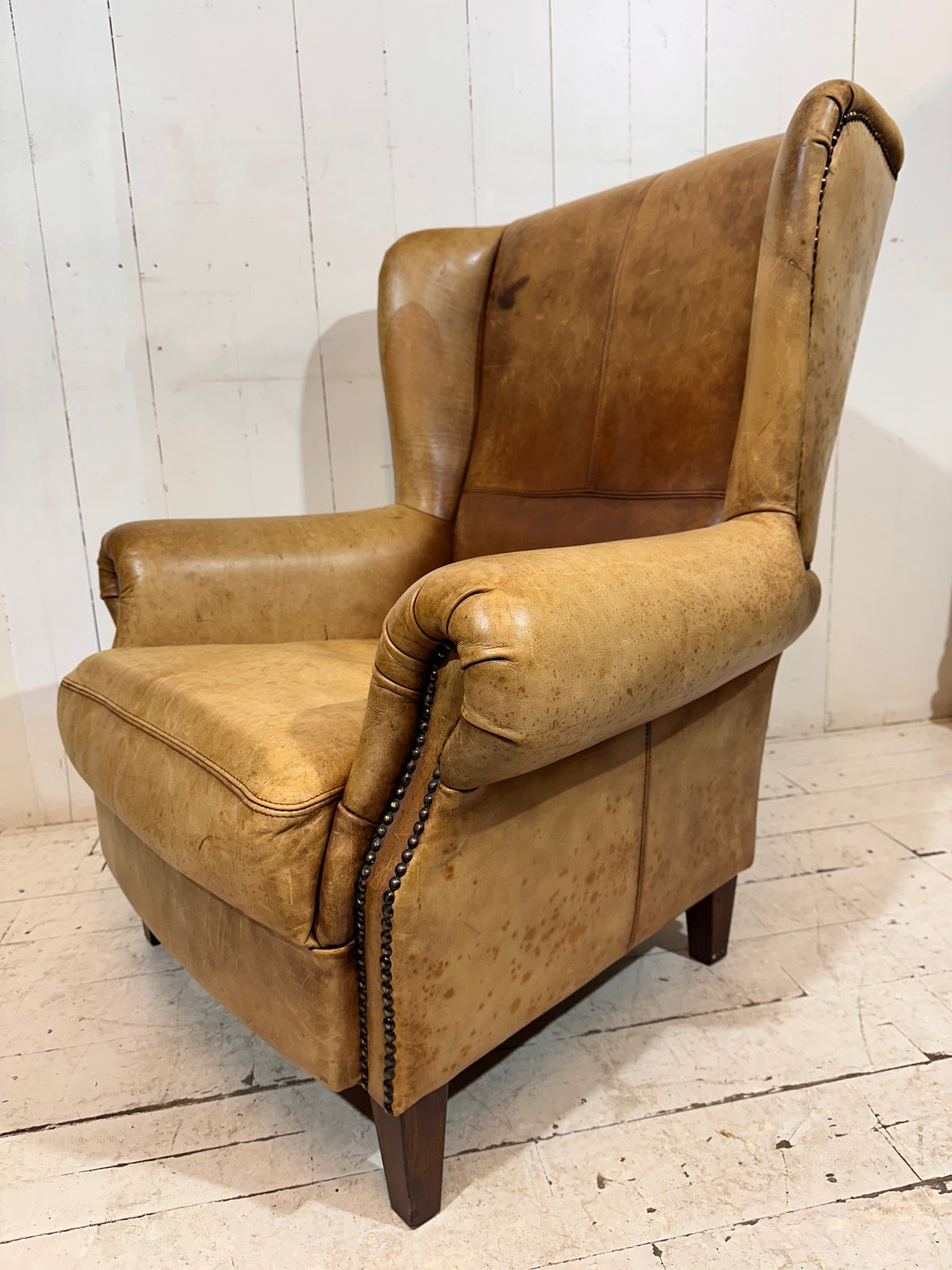 Vintage Distressed Leather Wingback Armchair