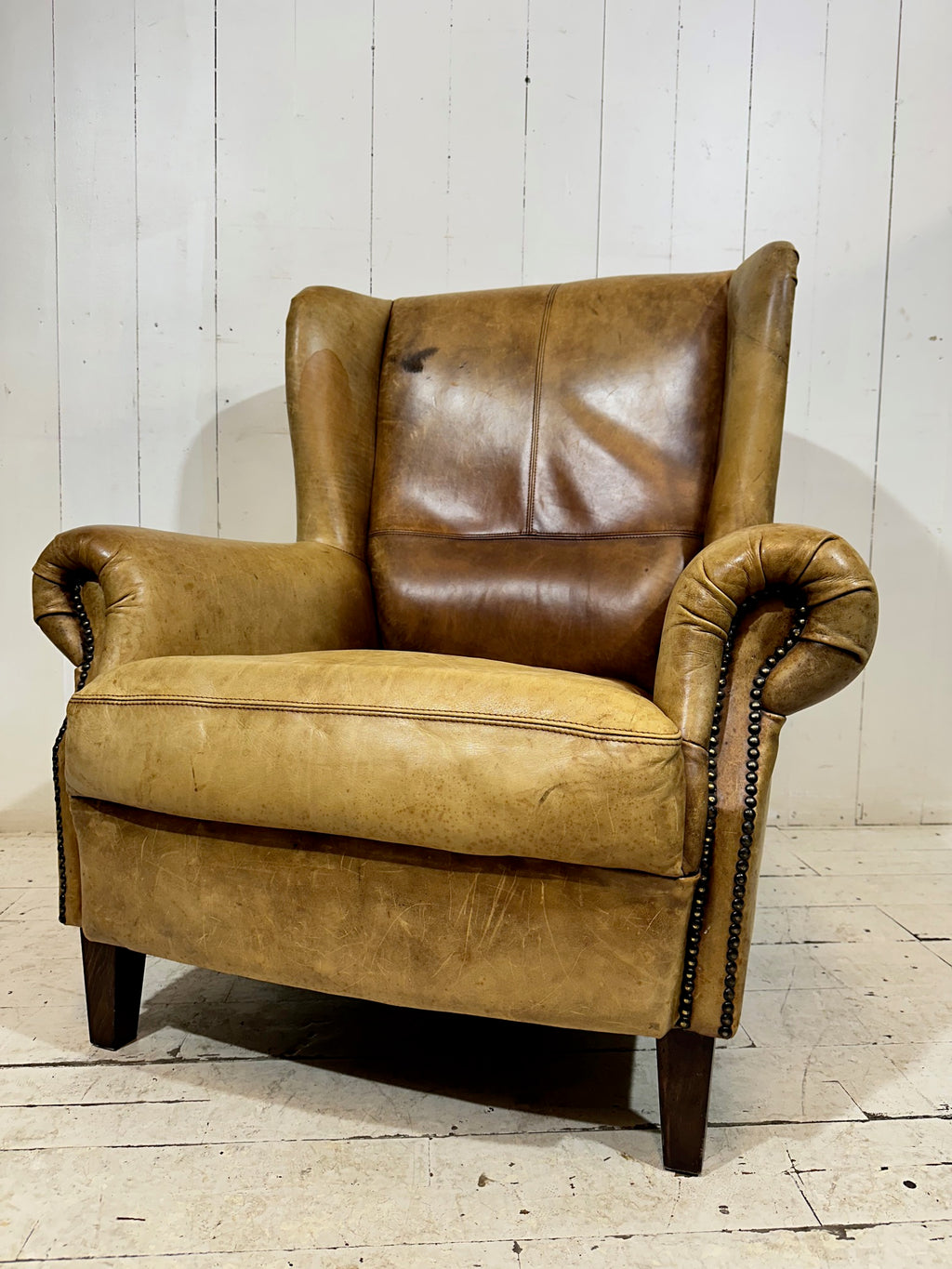 Vintage Distressed Leather Wingback Armchair