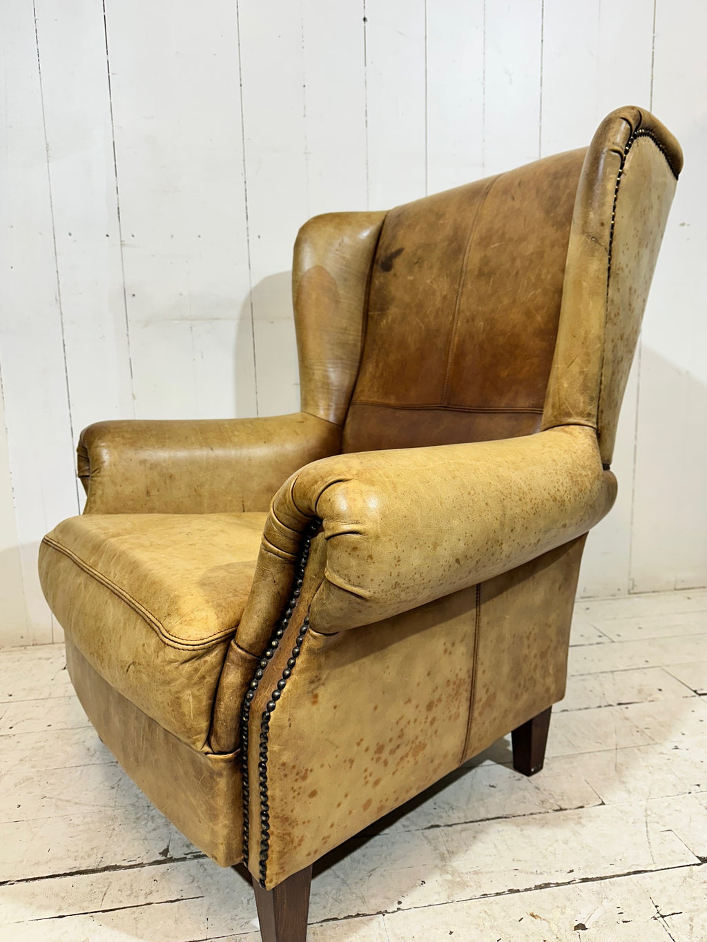 Vintage Distressed Leather Wingback Armchair