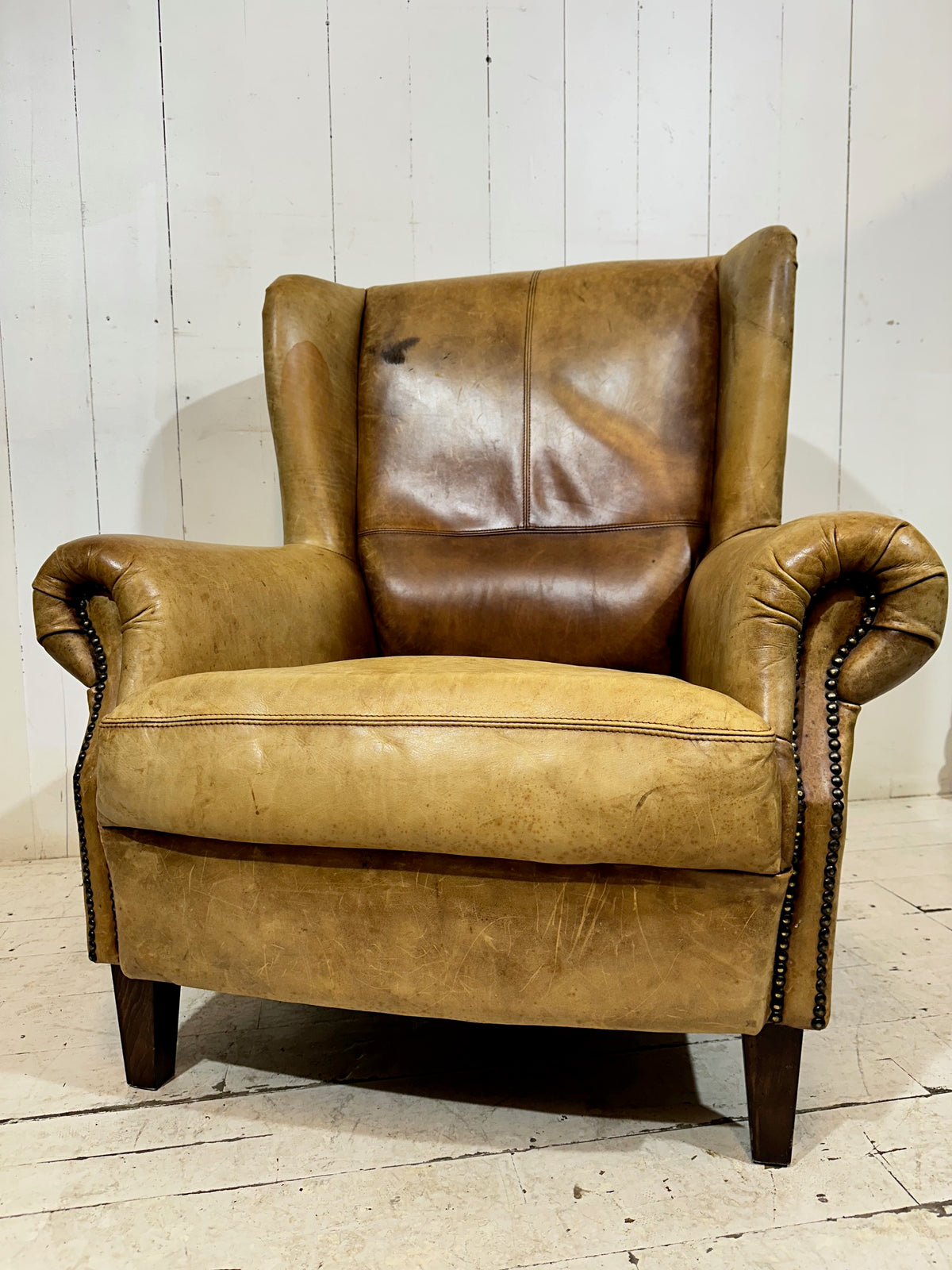 Vintage Distressed Leather Wingback Armchair